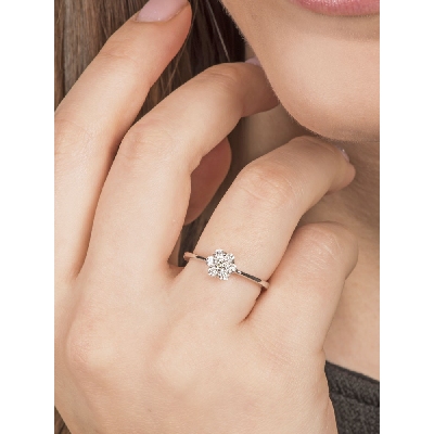 Anillo flor oro blanco 18k con diamantes