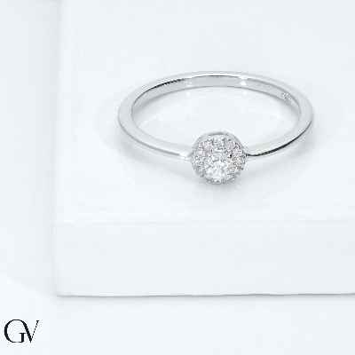 Anillo de oro blanco 18 quilates con halo de diamantes