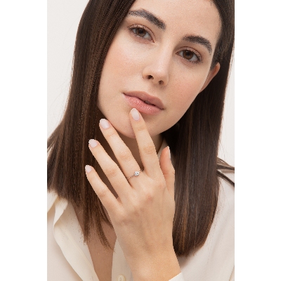 Anillo de oro blanco 18 quilates con halo de diamantes