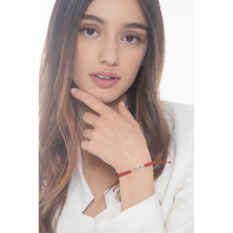 Pulsera con símbolo infinito en oro blanco 18k y diamantes Pulsera con símbolo infinito en oro blanco 18k y diamantes
