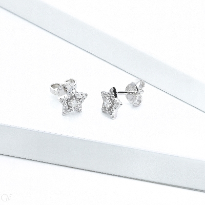Pendientes estrella en oro blanco de 18 quilates con diamantes