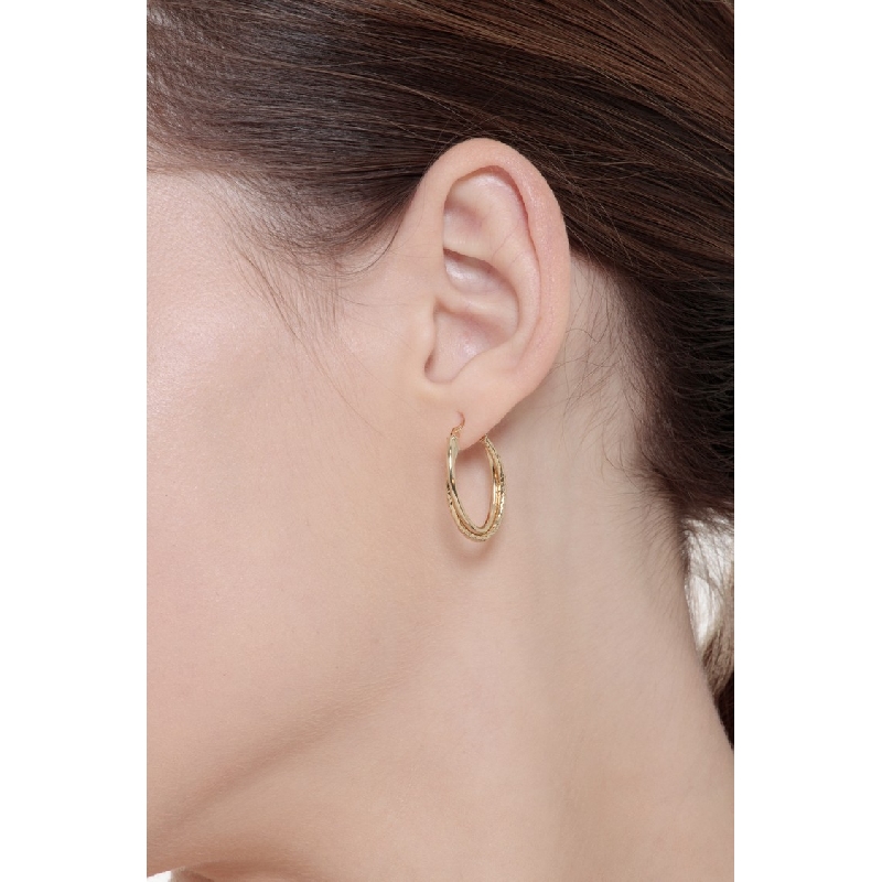Pendientes ovalados diamantados en oro amarillo 18k