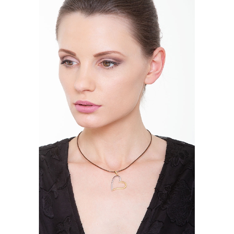 Colgante corazón en oro blanco y amarillo de 18K