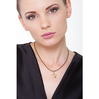 Colgante estrella en oro amarillo 18k