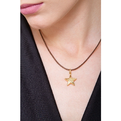 Colgante estrella en oro amarillo 18k