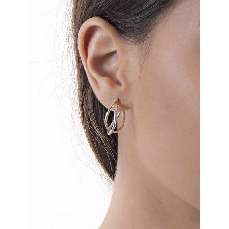 Pendientes ovalados entrelazados en oro blanco y amarillo