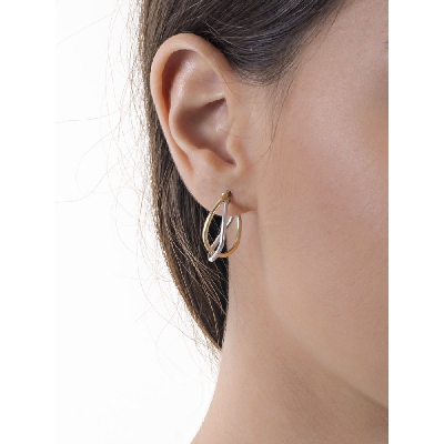 Pendientes ovalados entrelazados en oro blanco y amarillo