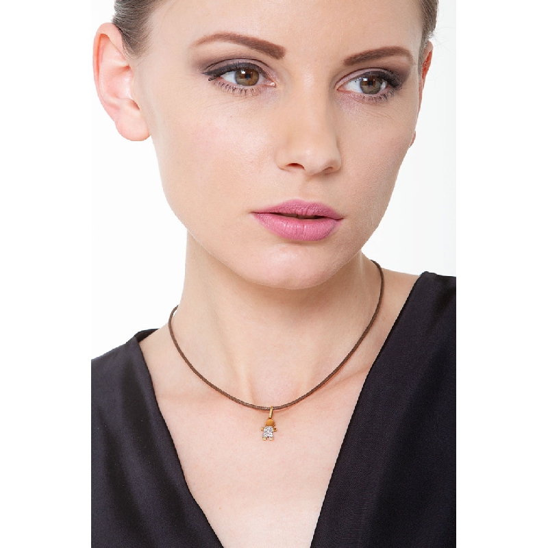 Colgante niño en oro amarillo 18k con pavé de zirconitas Colgante niño en oro amarillo 18k con pavé de zirconitas