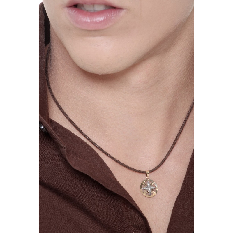 Colgante en oro blanco y amarillo de 18k con rosa de los vientos Colgante en oro blanco y amarillo de 18k con rosa de los vientos