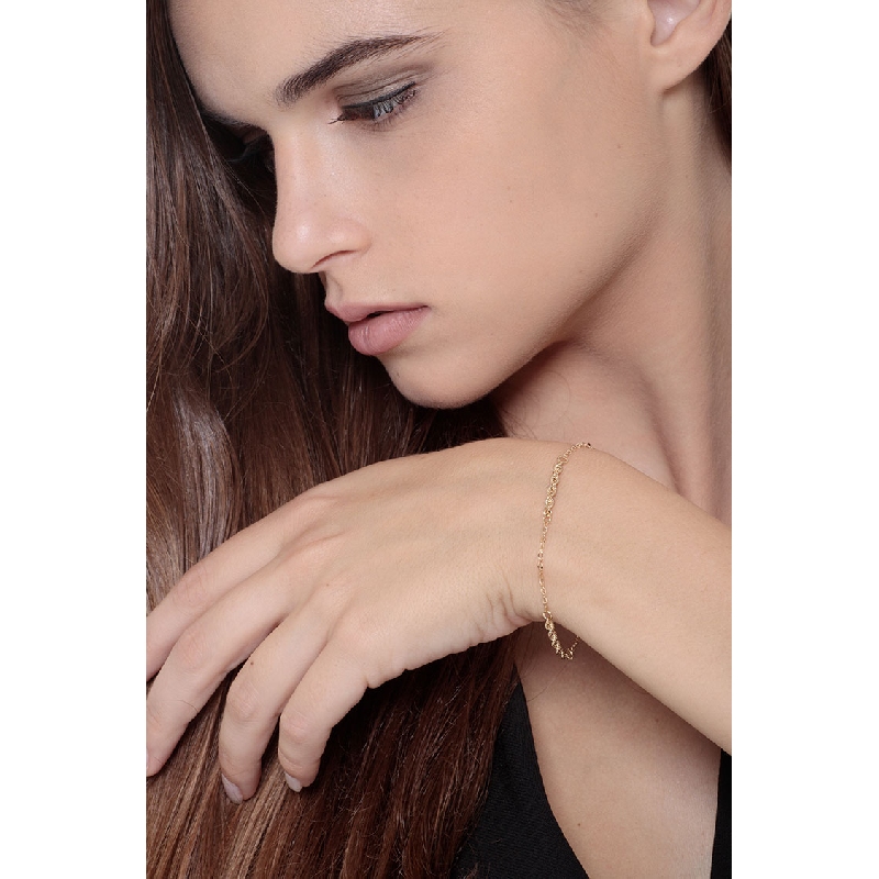 Pulsera en oro amarillo 18k con detalles entrelazados cm 20 Pulsera en oro amarillo 18k con detalles entrelazados cm 20